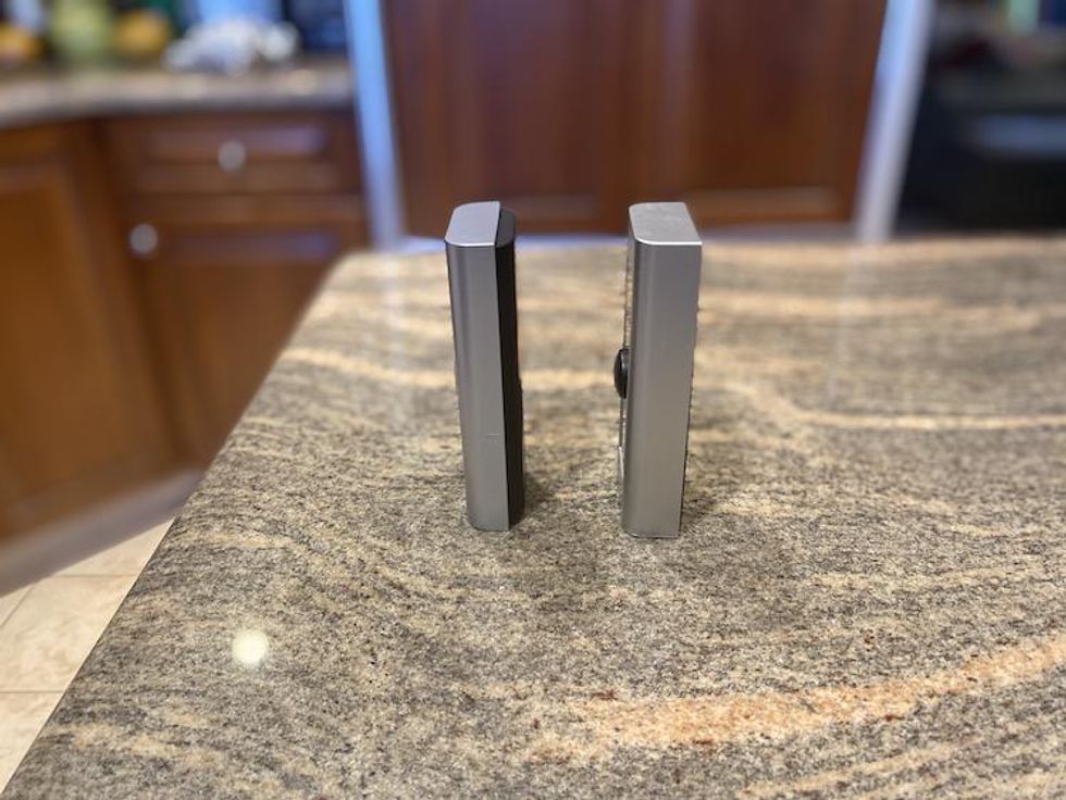 Ring Video Doorbell Pro 2 and Pro side by side on a counter.