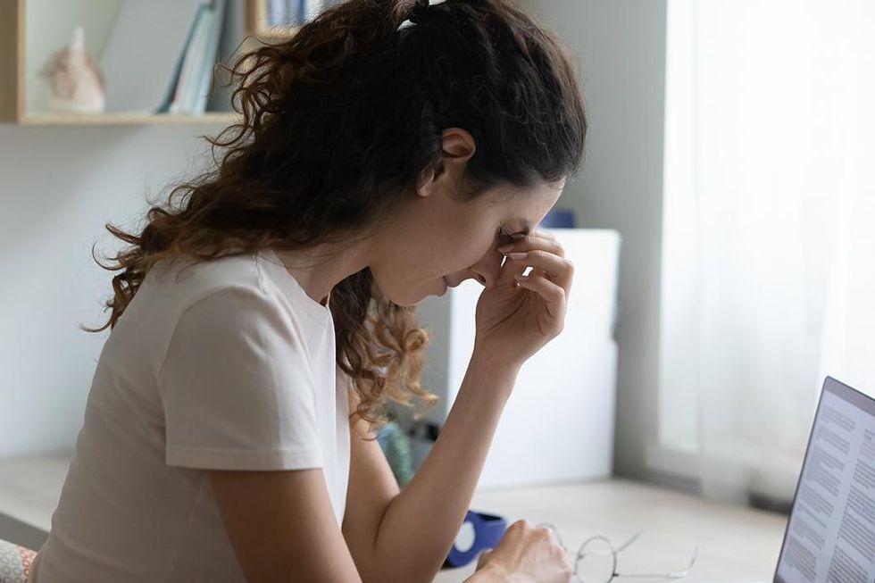 Woman stressed about her job