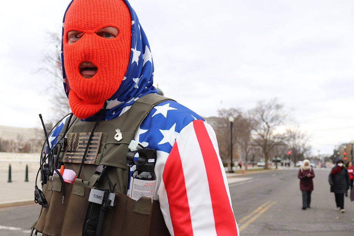 Capitol rioter marches in front of the US Supreme Court on January 6, 2021.