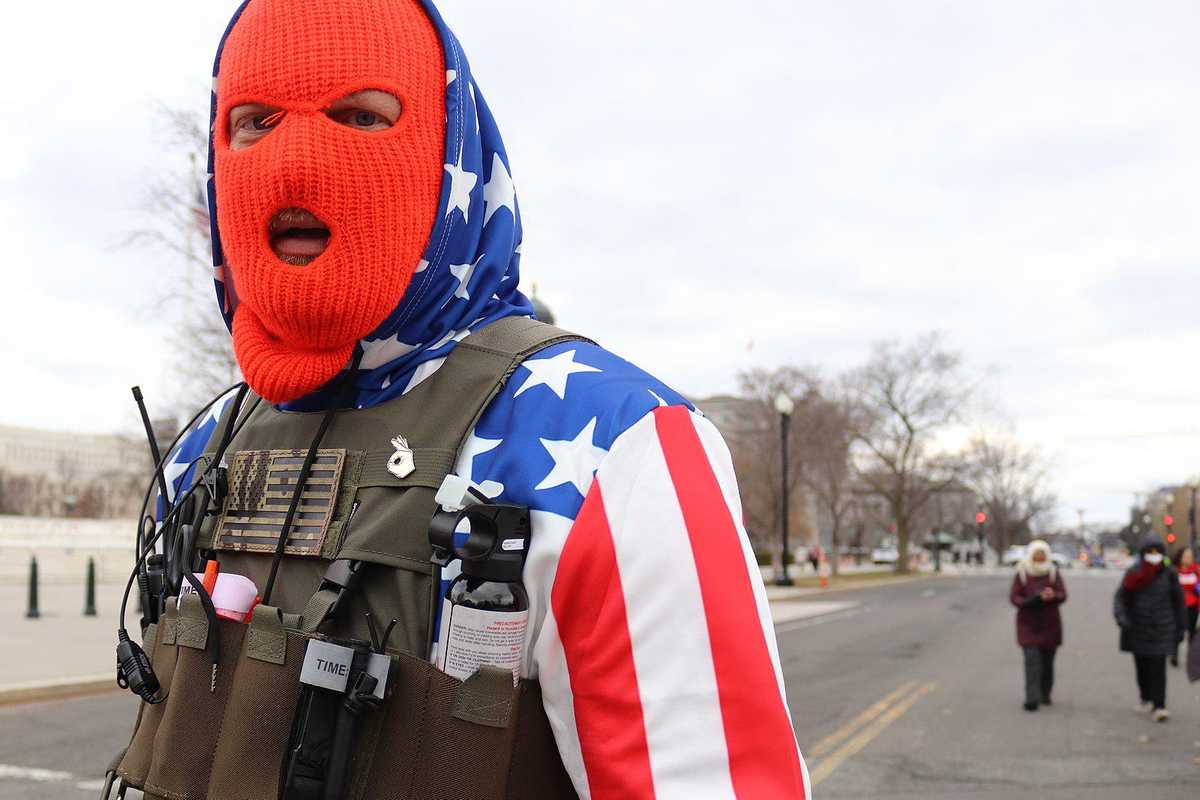 Capitol rioter marches in front of the US Supreme Court on January 6, 2021.