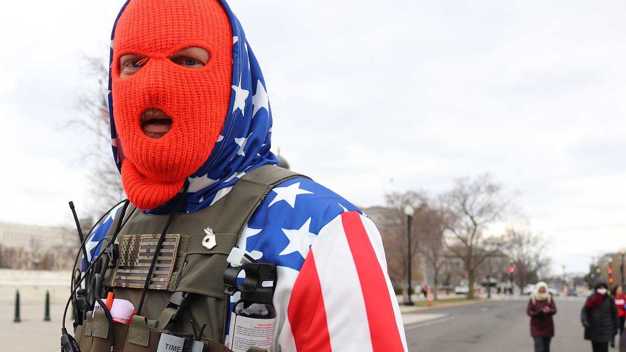Capitol rioter marches in front of the US Supreme Court on January 6, 2021.