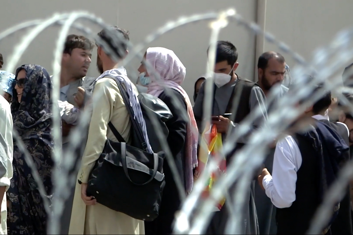 Afghans outside Kabul's airport. 