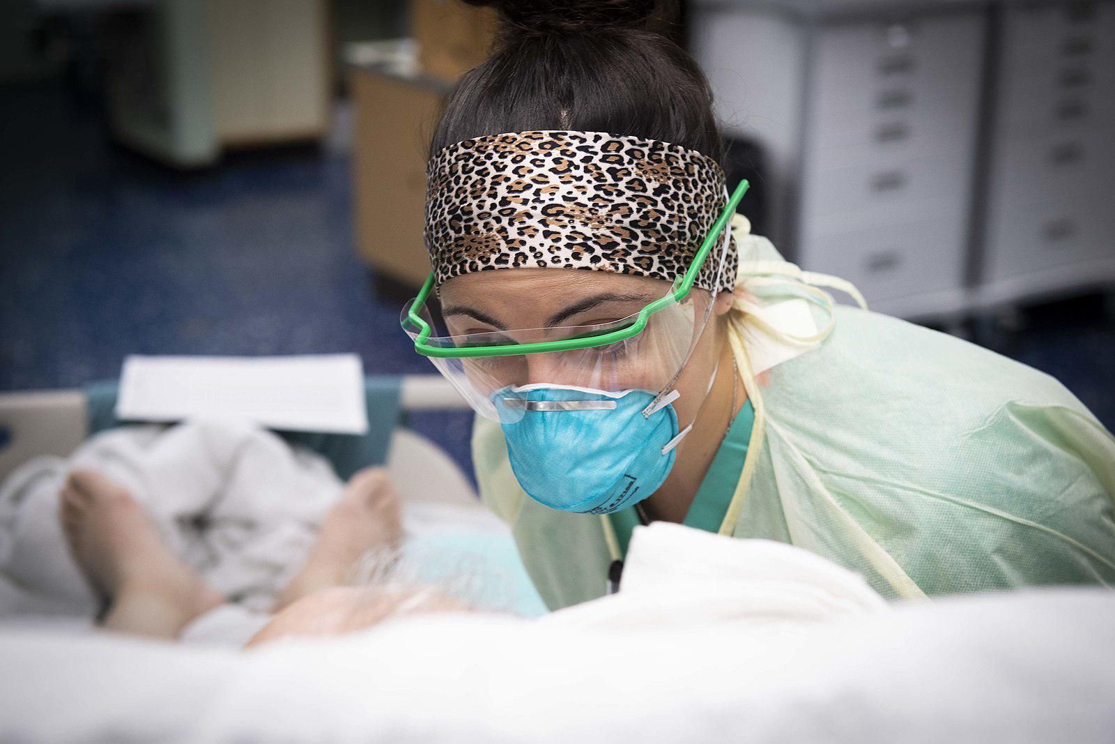 US Navy doctor with a COVID-19 patient in intensive care. 