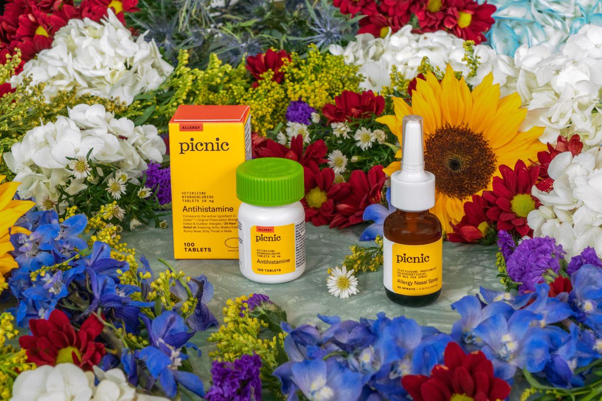 Picnic allergy medication next to flowers