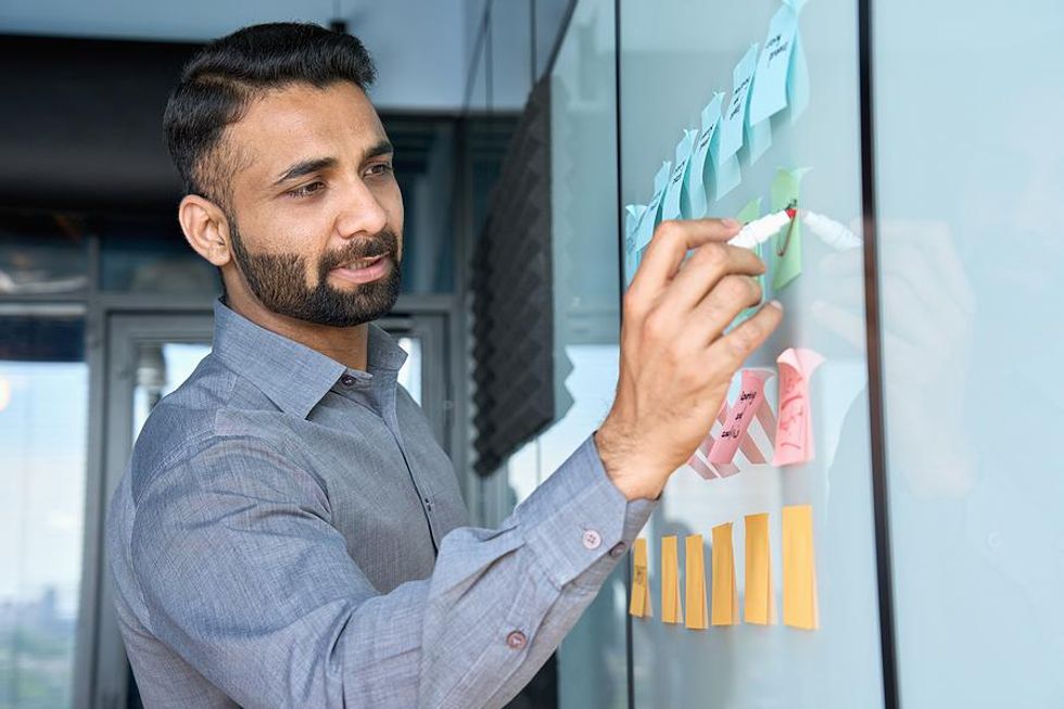 Man works on a project at his new job