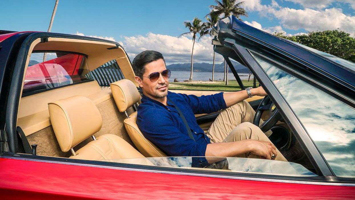 Jay Hernandez driving a Ferrari