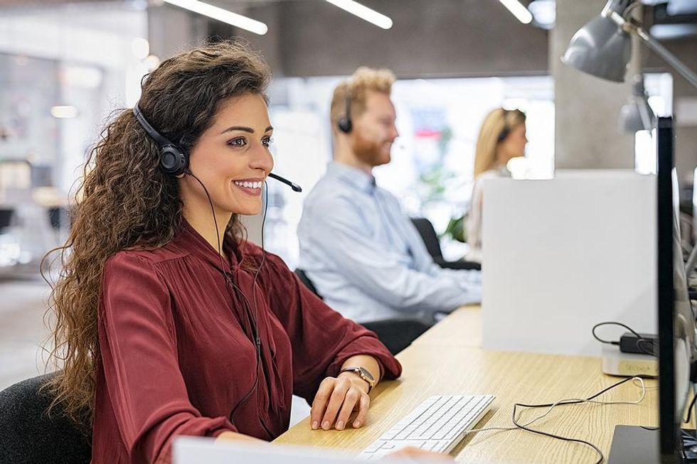 Woman sitting at her desk at work