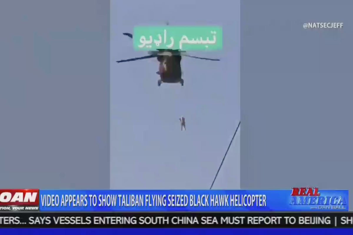 OAN displays debunked Afghanistan helicopter video.