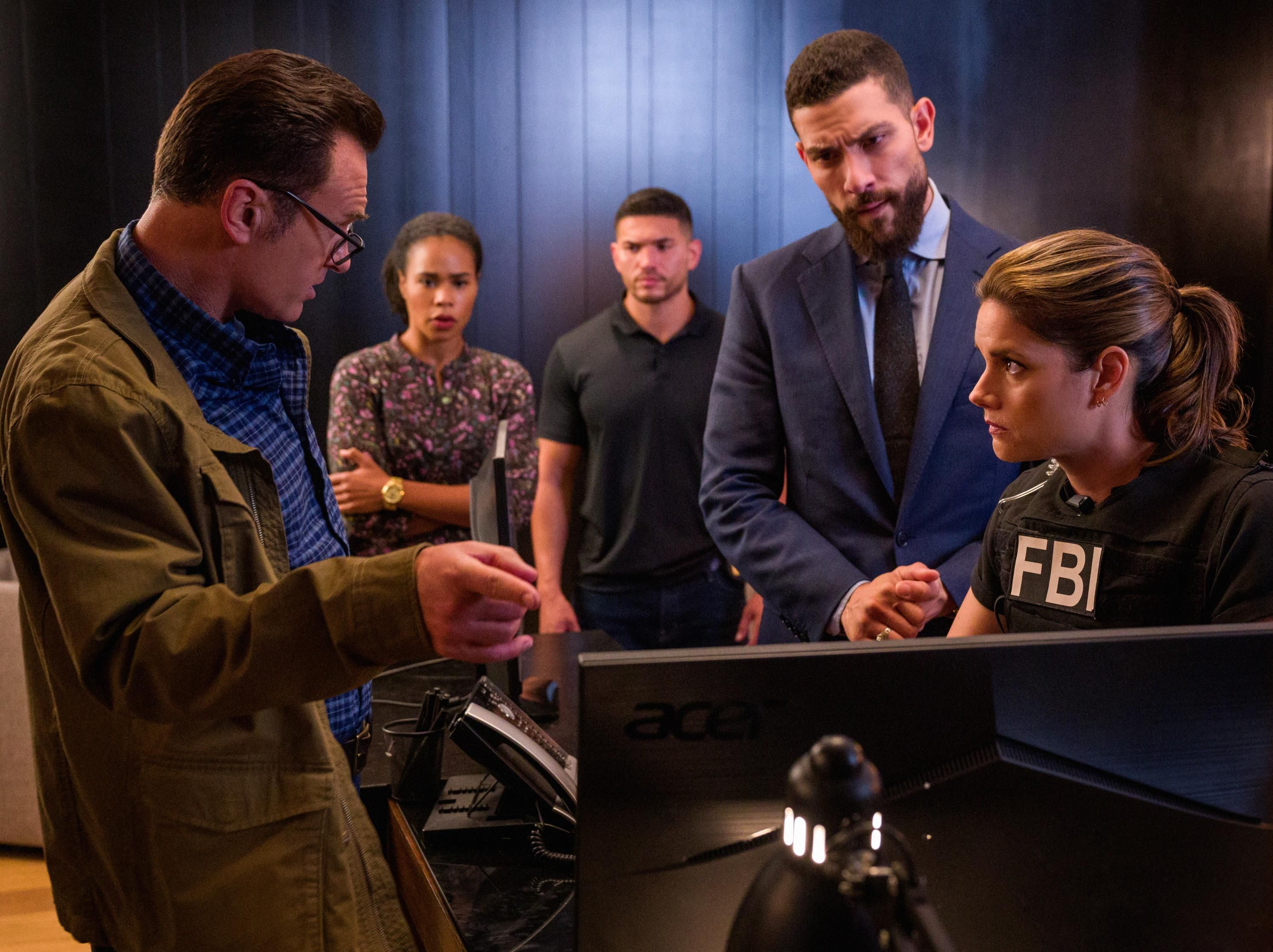 The casts of FBI and FBI: Most Wanted during a crossover event
