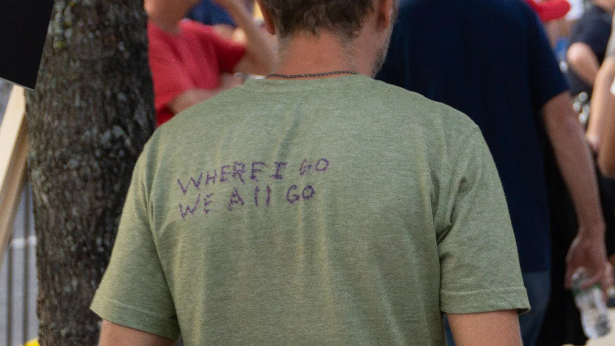 QAnon believer's shirt