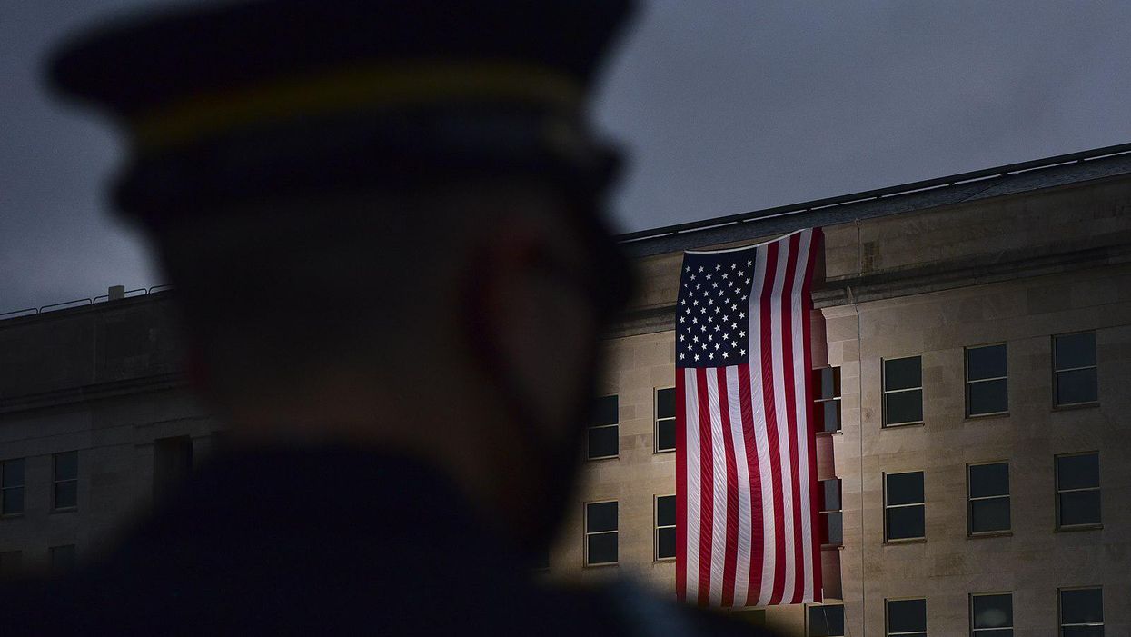 American flag is unfurled at the Pentagon on the 19th anniversary of the September 11th attacks.