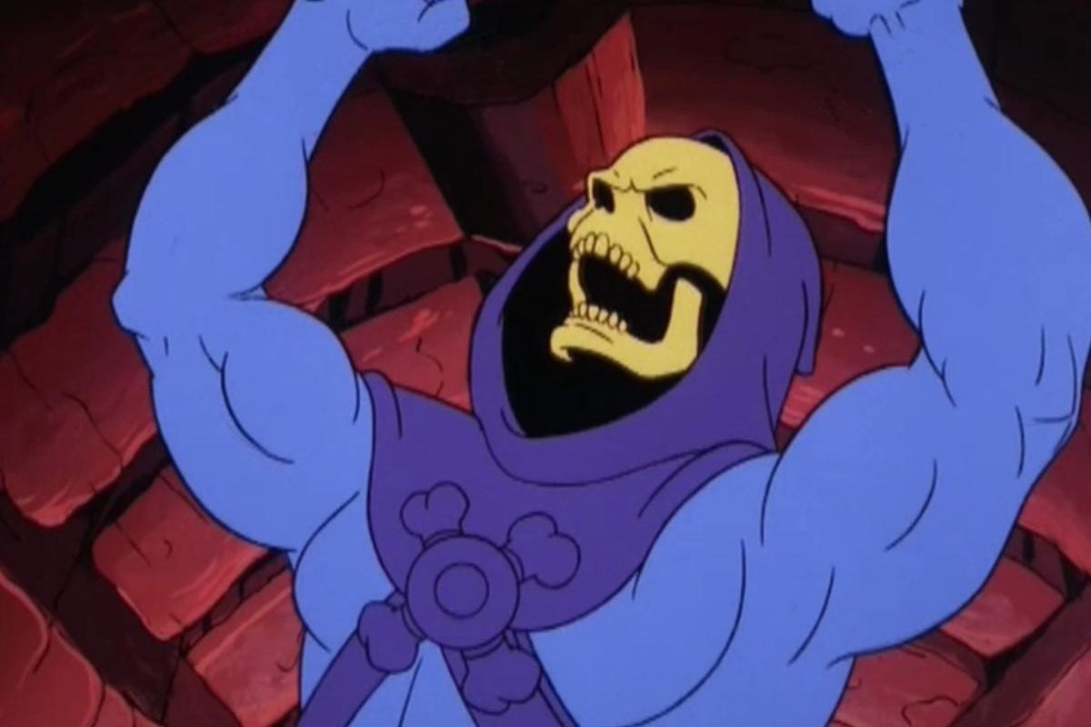 Skeletor shaking hands to the sky
