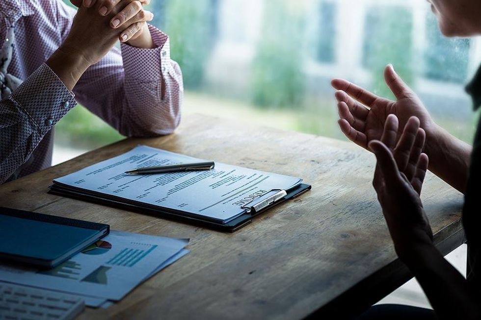 Employee talks to their manager during a performance review