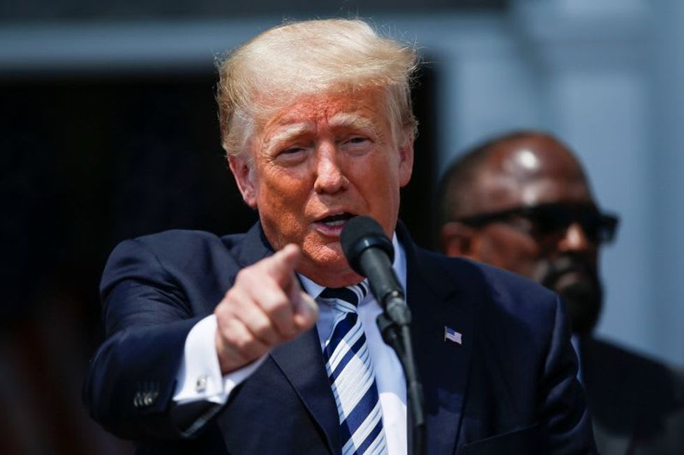 Republican Operatives Charged In Illegal Trump Donation Scheme