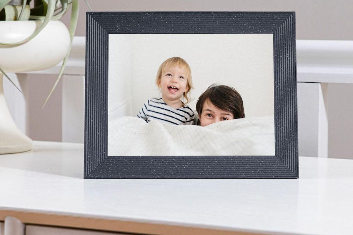 Mason Lux by Aura photo frame on a table top.