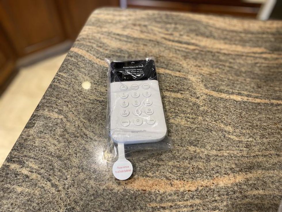SimpliSafe Wireless Keypad on a countertop.