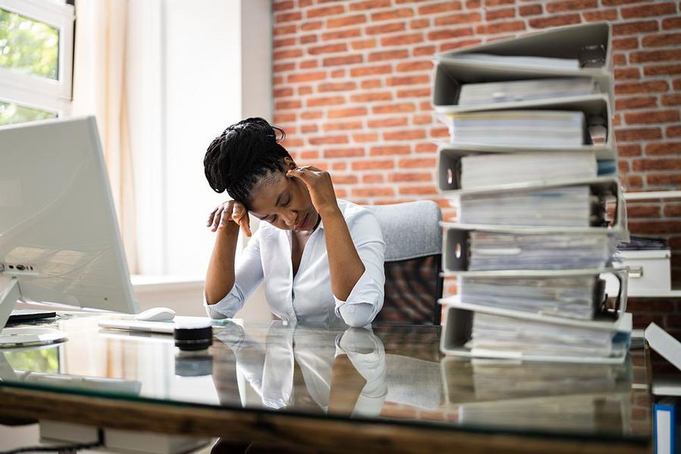 Professional woman experiencing job burnout