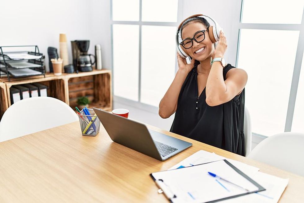 Happy woman manages her career