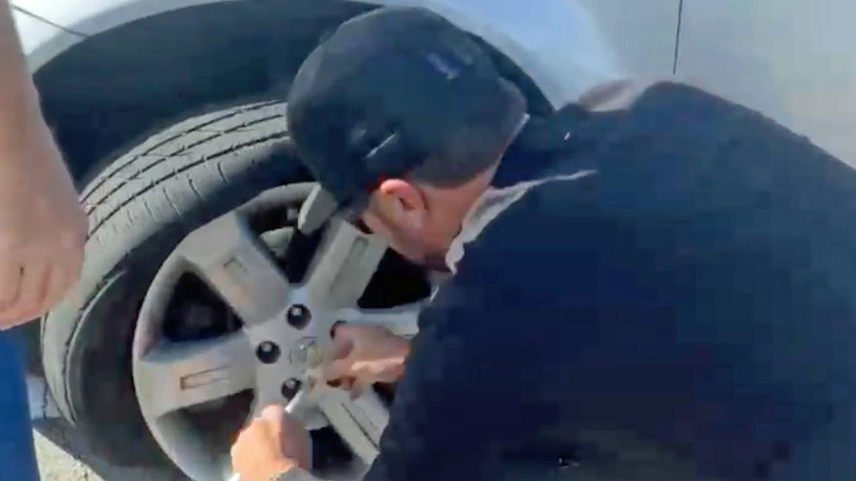 Country star Luke Bryan stops to help a single mom change a flat tire on curvy Tennessee road