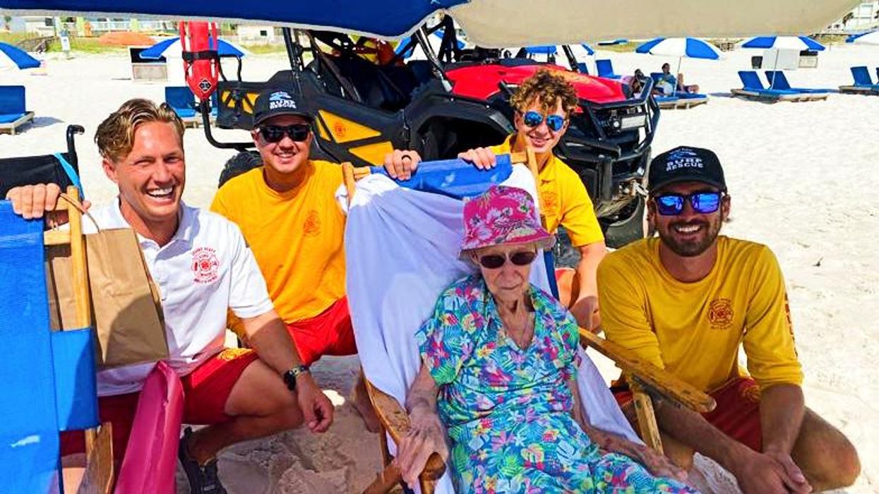 Lifeguards make 95-year-old’s dream come true by helping her feel the sand between her toes