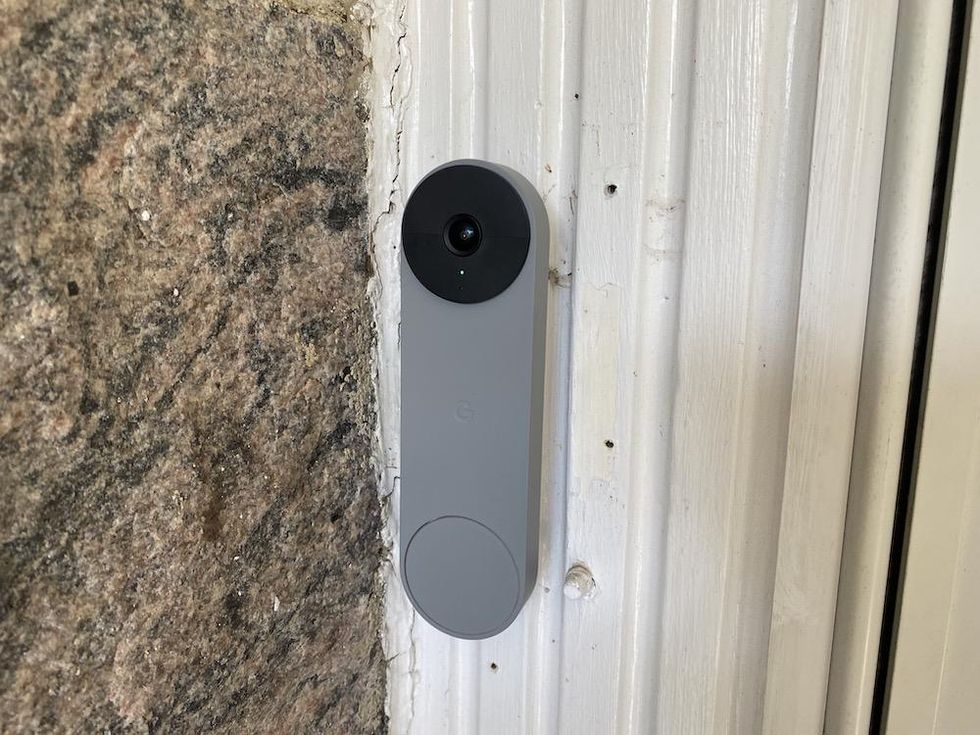 Google Nest Doorbell installed on a front door frame