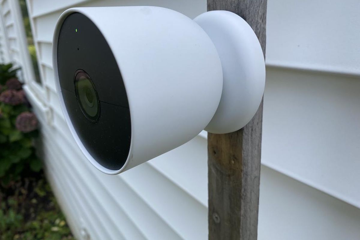 Google nest Cam installed outside on a house.