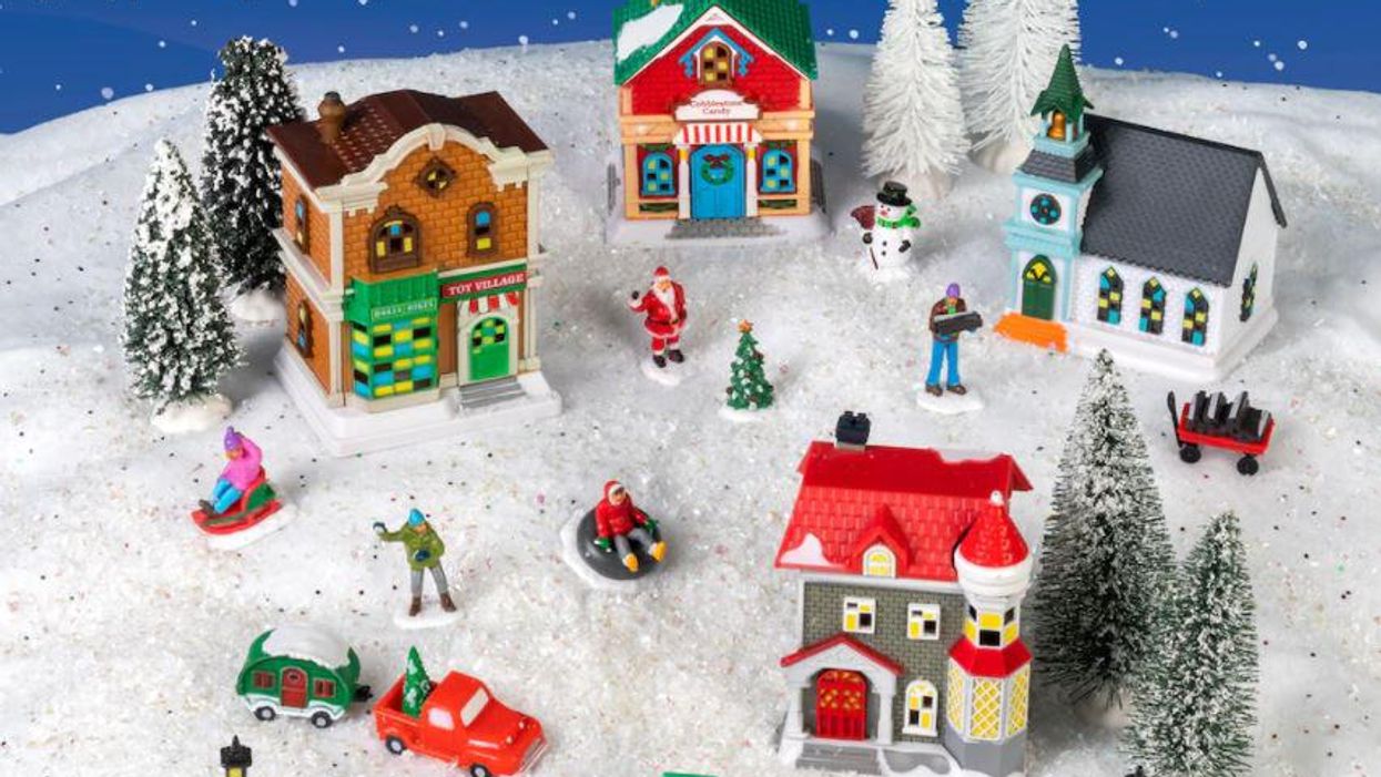 You can get this adorable 27-piece Christmas village for $13 at Dollar Tree