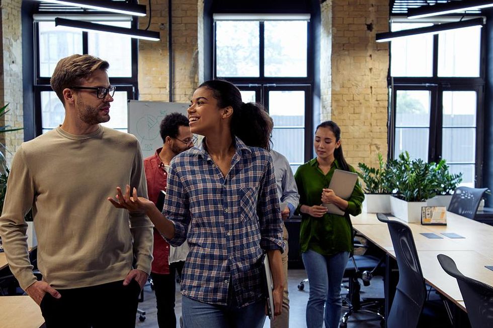 Employees take a walk during a break