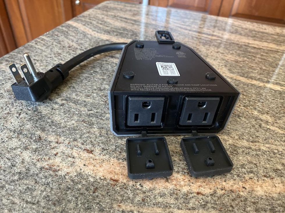 Defiant Smart Outdoor Plug on a countertop unboxed