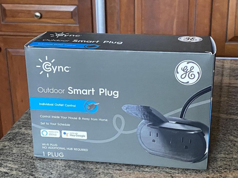 Cync Outdoor Smart Plug box on a countertop 
