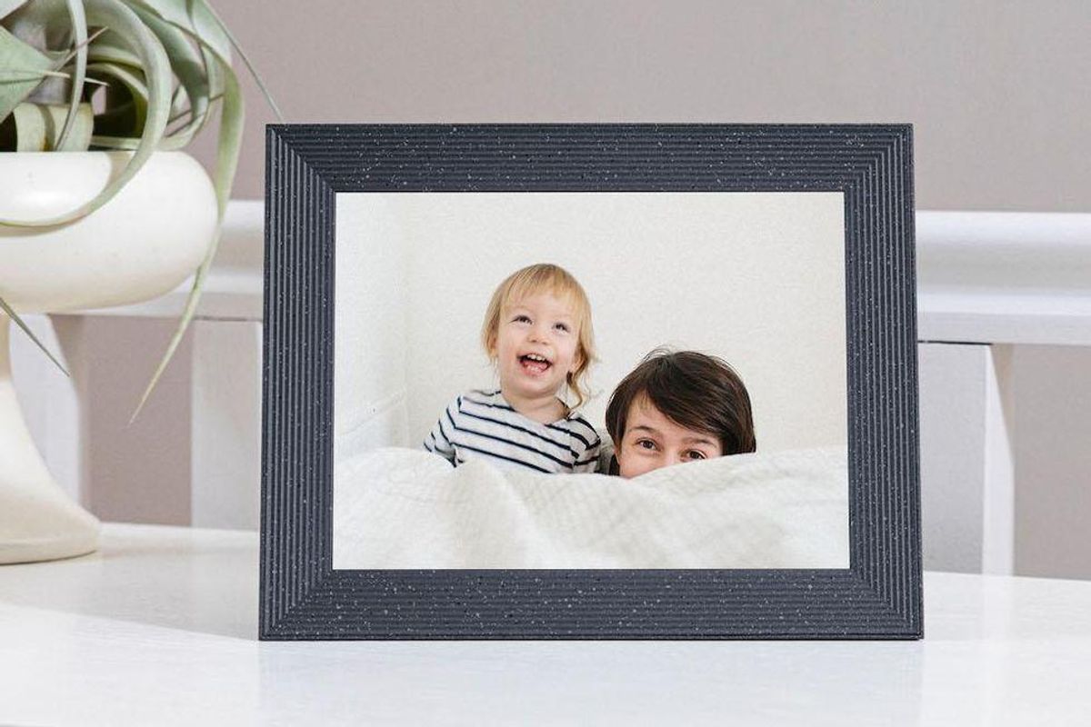 Mason Lux by Aura photo frame on a table top.