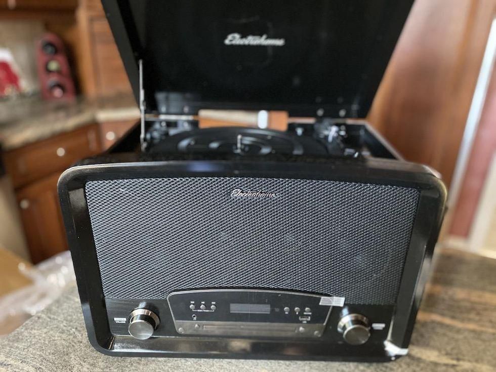 Electrohome Kingston 7-in-1 Vintage Vinyl Record Player is perfect for any smart home.