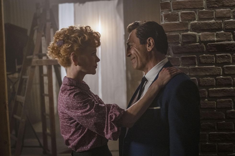 Nicole Kidman (left) as Lucille Ball stares at Javier Bardem (right) who plays Desi Arnaz in Amazon Studios' "Being the Ricardos."