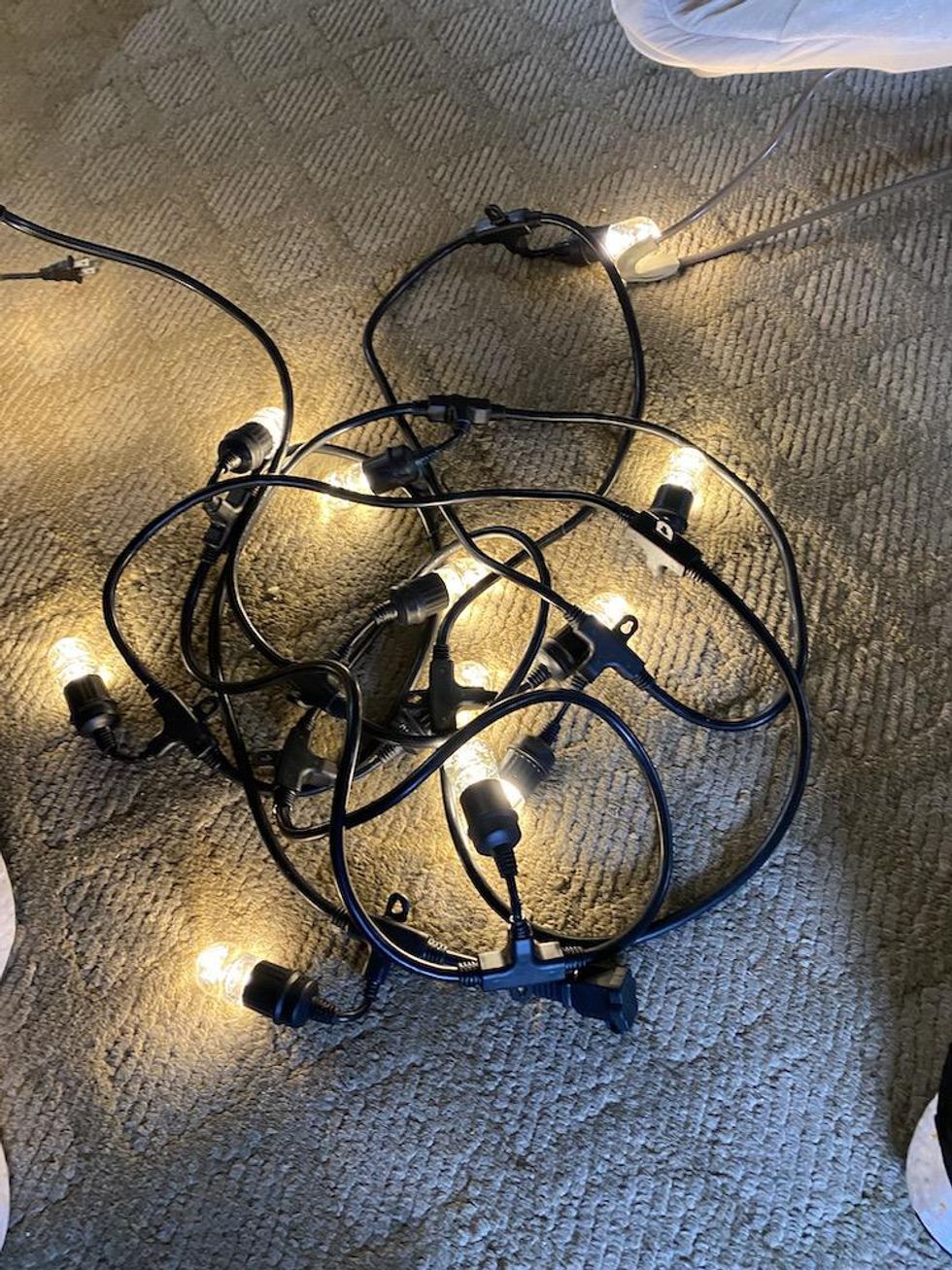 Enbrighten Smart Cafe Lights being paired to home wifi network inside a home.