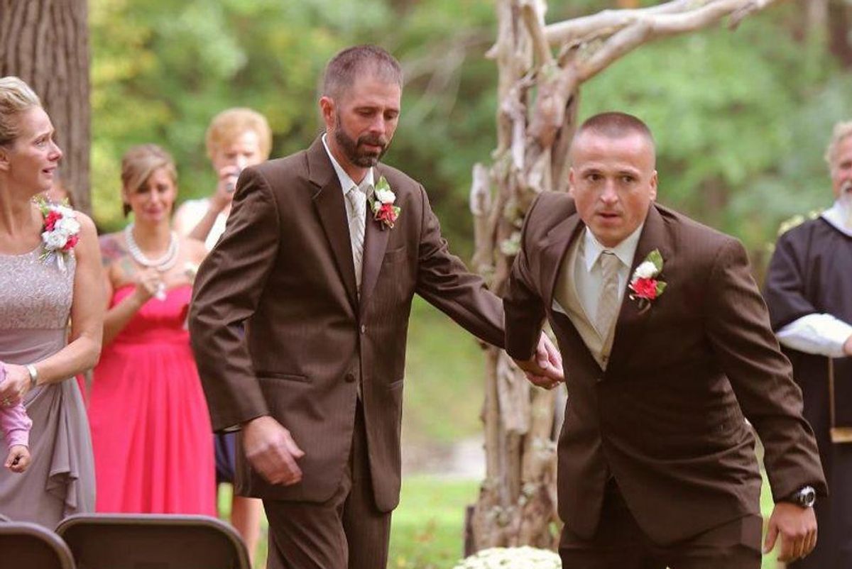 two men in tuxedos at a wedding