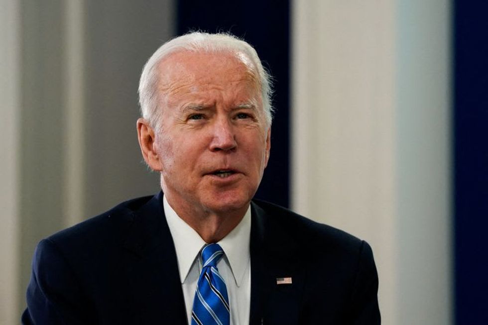 Biden inks $137 million contract to boost supply of key material for COVID tests -source