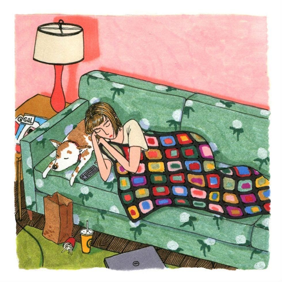 illustration of woman napping with her dog on her couch