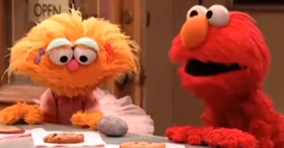 Elmo Hilariously Weighs In After The Internet Discovers His Epic Feud With A Pet Rock On 'Sesame Street'