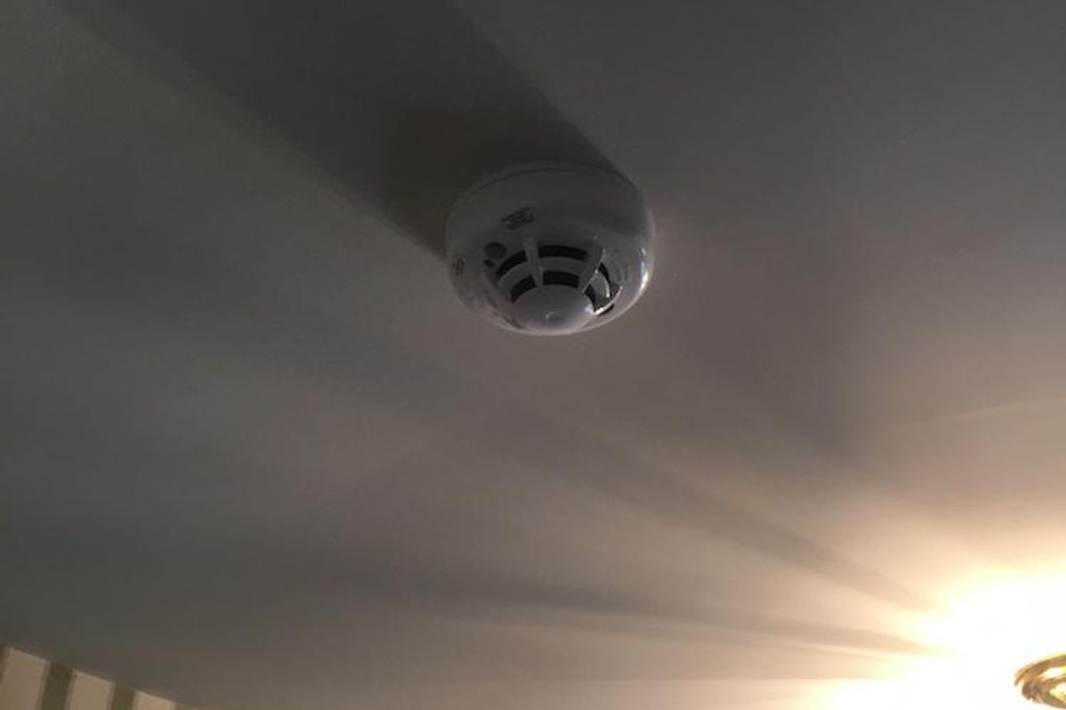 Vivint Smoke Detector installed on the ceiling inside a home.