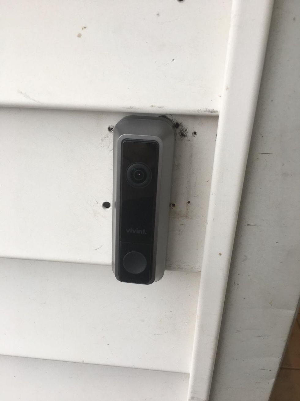 Vivint Video Doorbell installed on the side of the house.