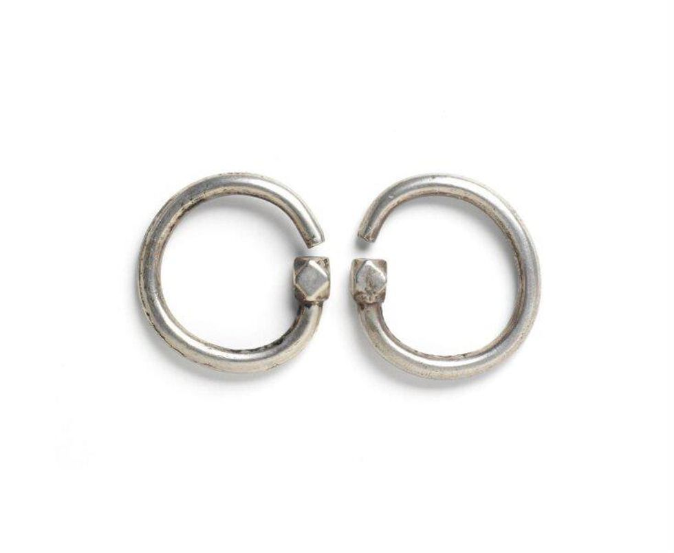 An old pair of silver hoop earrings
