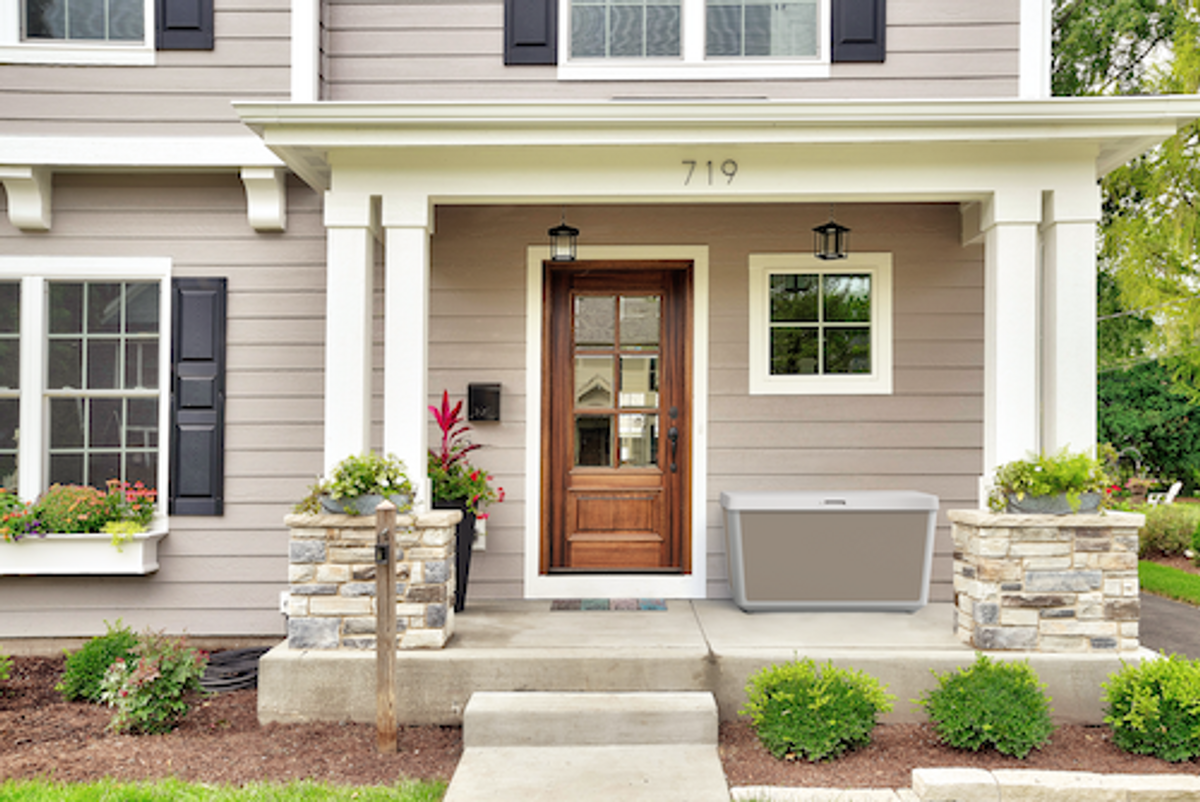 Photo of a home with HomeValet Smart Box ouside on a porch