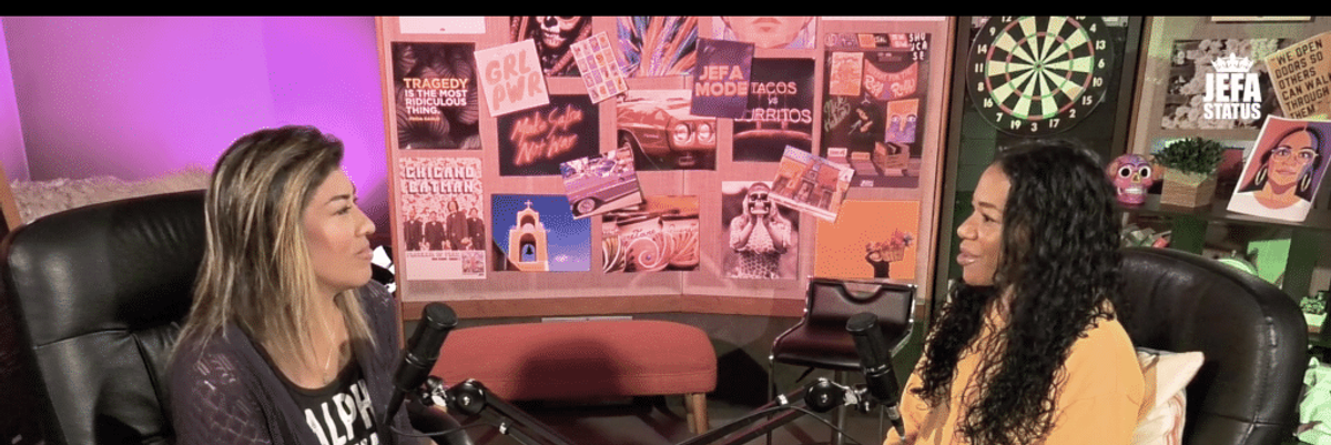 Lucy Flores and Keta Meggett sitting in a podcasting booth