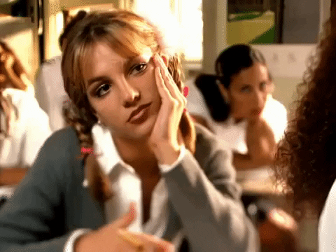 gif of Britney Spears in 'Oops I Did it Again' video