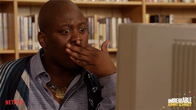 Gif of Tituss Burgess at a computer in TV show "Unbreakable Kimmy Schmidt