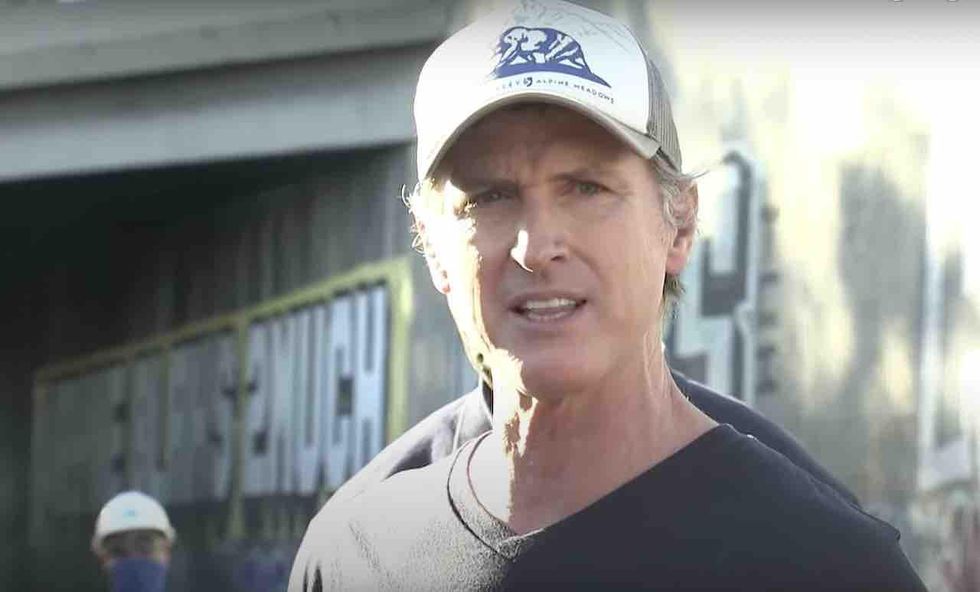 Gavin Newsom asks, 'What the hell is going on?' after seeing thousands of stolen, trashed delivery boxes along LA train tracks — and he's massively mocked