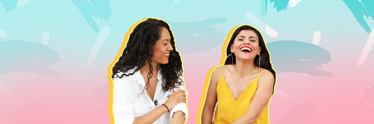 Two Latinas laughing