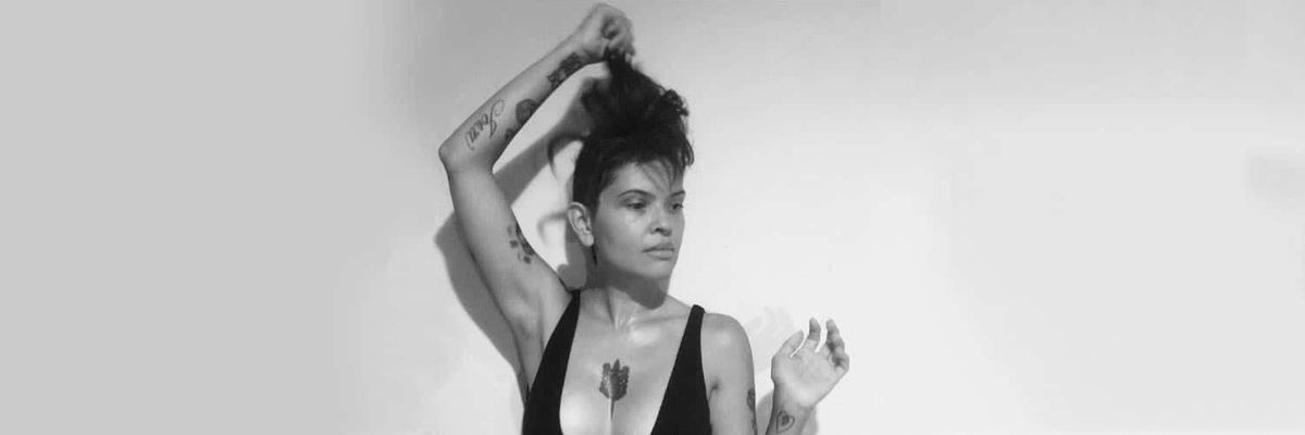 Myriam Gurba pulling her hair