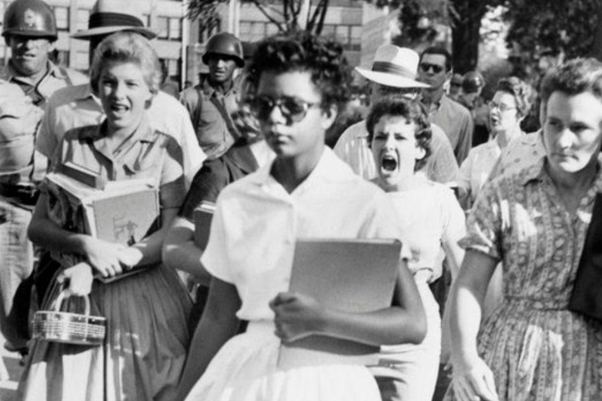 Elizabeth Eckford made history at age 15. Here's the full story behind the iconic photo.