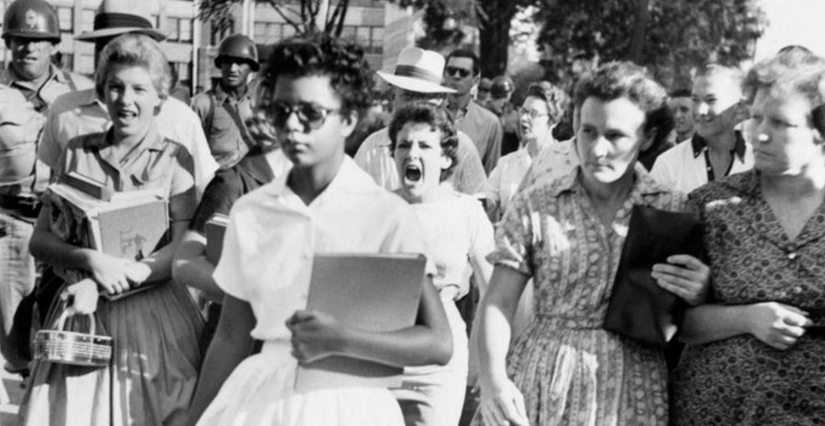 Elizabeth Eckford made history at age 15. Here's the full story behind the iconic photo.